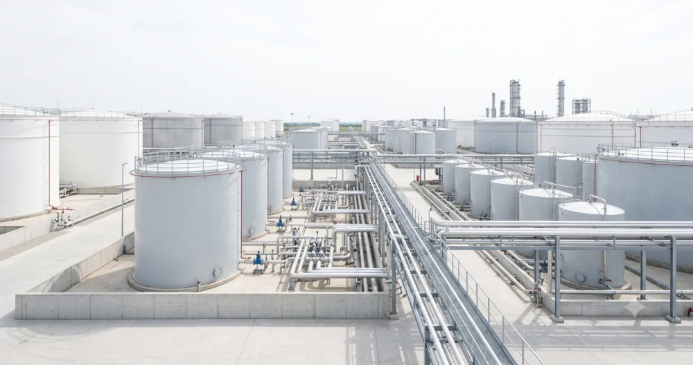 Petrochemical tank farm with storage tanks and pipework